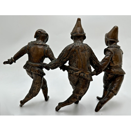 2398 - Good mid 20th century bronze character group of three performing clowns or Pierrots, unsigned, 19cm ... 