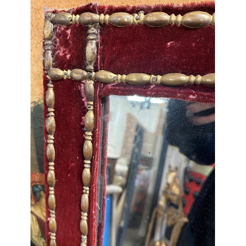 1070 - 19th century French velvet framed mirror with applied copper bands, 127 x 66cm