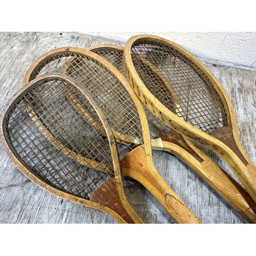 258 - Early Williams Co Paris 'Frezo B' tennis racket, A W Gamage of London 'Champion' tennis racket and t... 