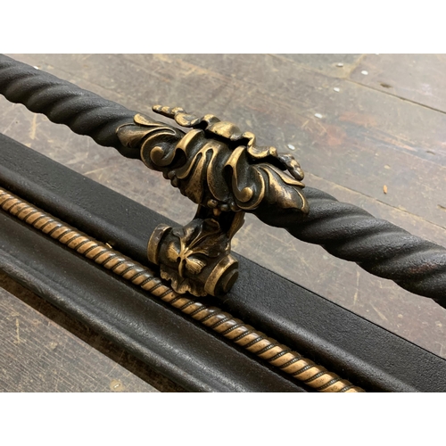 1287 - Good quality French cast metal twist rope design Fender with gilt metal detailing. W 150cm x D 36cm ... 