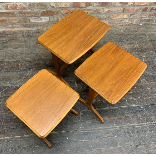 1292 - Retro mid-century teak nest of three tables. Largest measures H 48cm with top measuring 53 x 36cm.