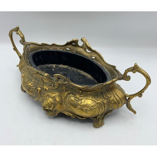 2385 - Twin handled brass Art Nouveau planter with liner. W 33cm x H 12cm.