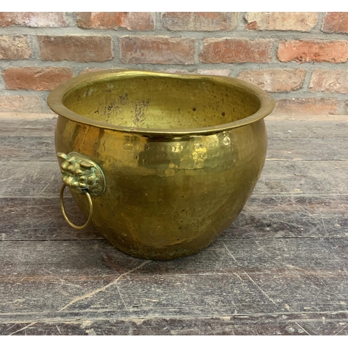 2387 - Heavy brass coal or log bucket with twin handled Lion Head design. H 27cm x D 35cm.