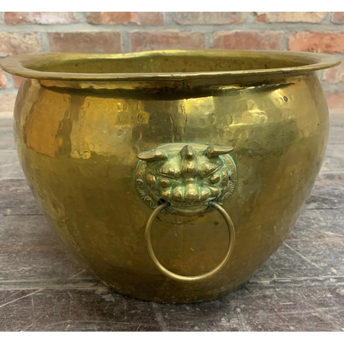 2387 - Heavy brass coal or log bucket with twin handled Lion Head design. H 27cm x D 35cm.