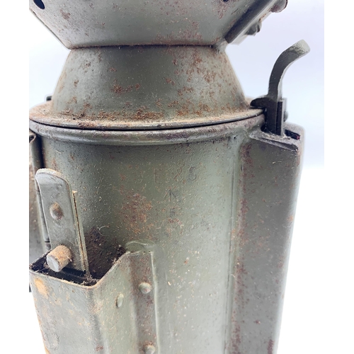 1093 - C Eastlake and Sons Green Railroad Lantern With Military Crow Foot Markings. H 32cm.