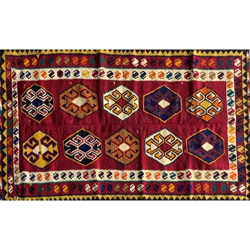 1434 - Good quality Persian Qashgai kilim, ten medallions on red ground, 250 x 140cm