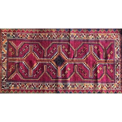 1435 - Good quality Persian Lori rug, bespoke medallion design on purple ground, 270 x 130cm