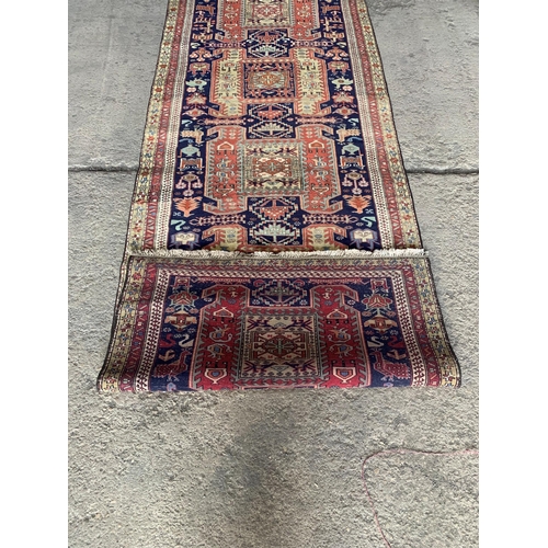 1439 - Good Quality North West Persian Bidjar runner, bespoke five medallion design on blue ground, 330 x 1... 