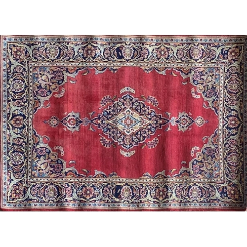 1443 - Traditional Persian Kashan rug, central blue medallion on red ground, 220 x 130cm