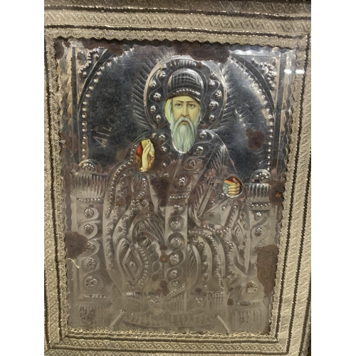 1369 - Framed Silvered Background Russian Religious Icon Figure. 45cm x 39cm.