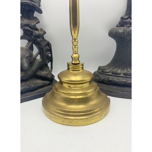 2393 - Quantity of antique brass and cast iron door stops to include fox example (3)