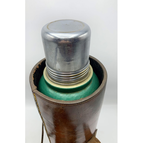 246 - Good quality vintage huntsman leather flask case with original flask, with strap, 42cm high