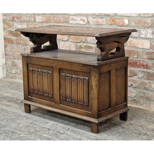 1307 - Carved oak fold over top monk's bench with box base, H 74cm x W 92cm x D 47cm