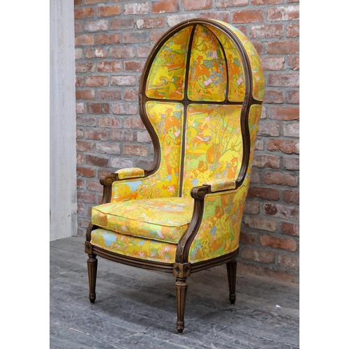 1310 - 20th century American hooded porter's chair finished in Bohemian style upholstery raised on turned f... 