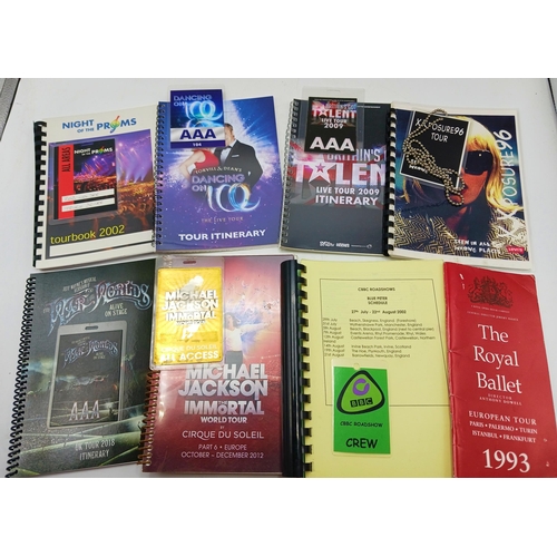 33 - A collection of 14 tour itineraries and laminated passes: consisting of:- Cirque du Soleil, Michael ... 