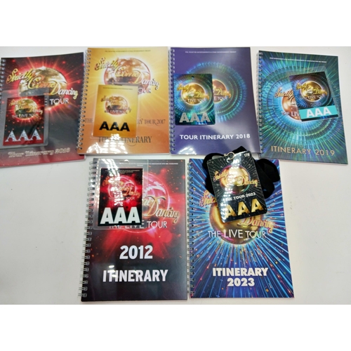 33 - A collection of 14 tour itineraries and laminated passes: consisting of:- Cirque du Soleil, Michael ... 