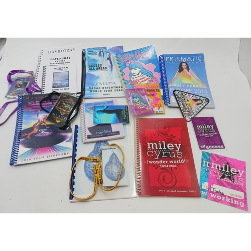35 - 10 tour itineraries for:- Miley Cyrus, Wonderful World tour, 2009, with one laminate pass and two st... 