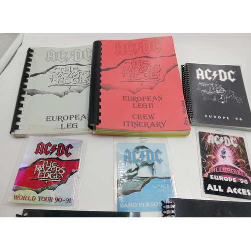 39 - A collection of itineraries and passes from tours by AC/DC consisting of:- The Razors Edge tour, 199... 