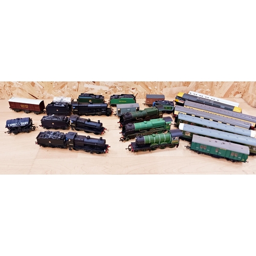 354 - Large collection Of 00 Gauge trains, wagons & tracks.