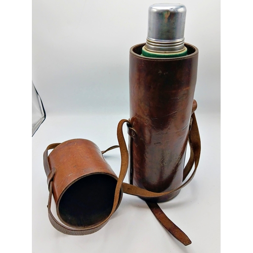 246 - Good quality vintage huntsman leather flask case with original flask, with strap, 42cm high