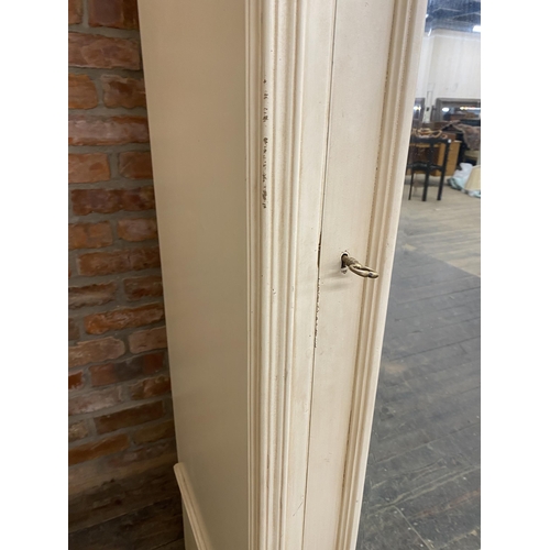 1253 - French Rococo style cream painted armoire with arch bevelled mirror door, H 237cm x W 105cm x D 59cm