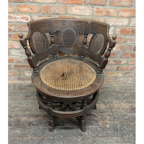 1345 - Anglo Indian carved hardwood Burgermeister chair with curved back, cane seat and back panels, H 80cm... 