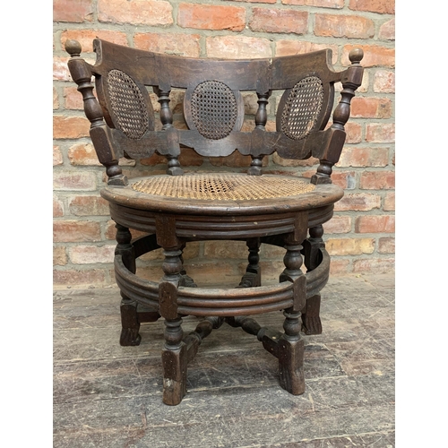 1345 - Anglo Indian carved hardwood Burgermeister chair with curved back, cane seat and back panels, H 80cm... 