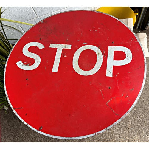 1030 - Bespoke occasional table, with cast iron Singer treadle base and enamel STOP road sign top, 72cm hig... 