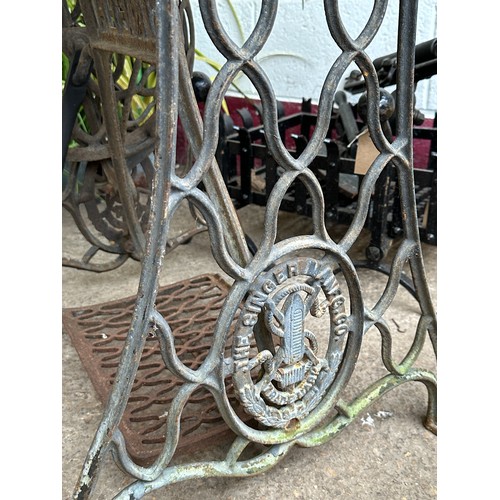 1030 - Bespoke occasional table, with cast iron Singer treadle base and enamel STOP road sign top, 72cm hig... 