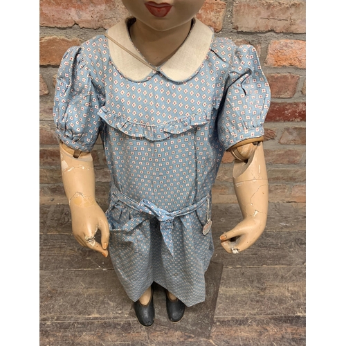 410 - Art Deco period girl ex-shop mannequin, in a period dress with original Texi-Soft tag, 100cm high