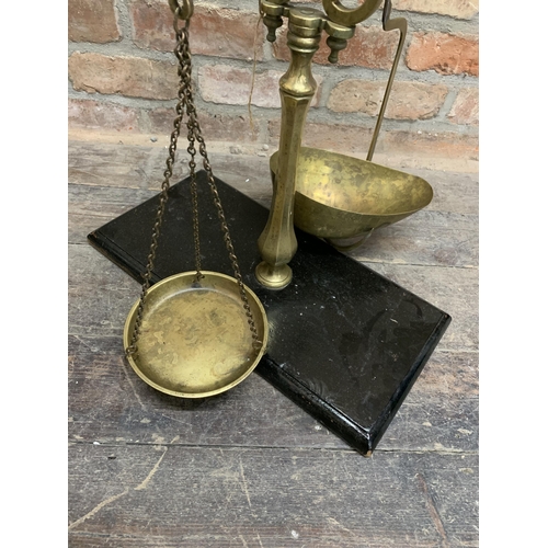 2402 - Good quality 19th century brass weighing scales, on painted moulded wooden plinth base, 67cm high