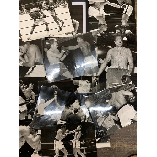 432 - A good quality collection of Muhammad Ali press release photographs for his bouts with Henry cooper ... 