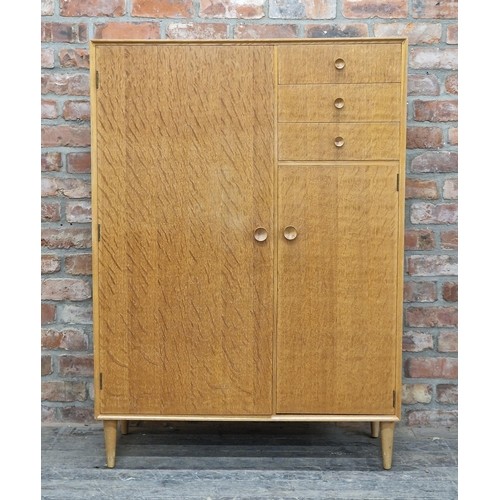 1144 - Vintage Meredew light oak veneered compactum wardrobe, H 132cm x W 94cm x D 46cm