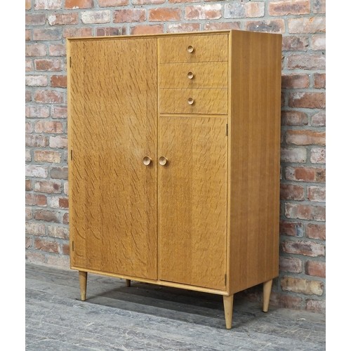 1144 - Vintage Meredew light oak veneered compactum wardrobe, H 132cm x W 94cm x D 46cm