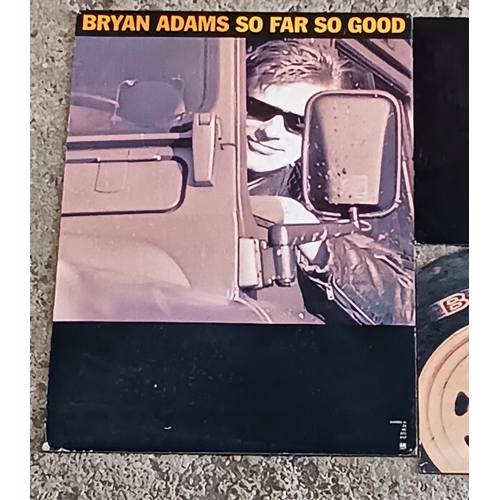 114 - Bryan Adams 'waking up the neighbours' promotional cardboard cutout together with three other promot... 