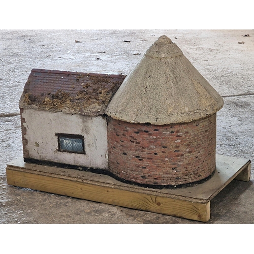 1016 - Large reconstituted stone Kent Oast House model, from a Sussex model village L 104cm x W 48cm x H 74... 