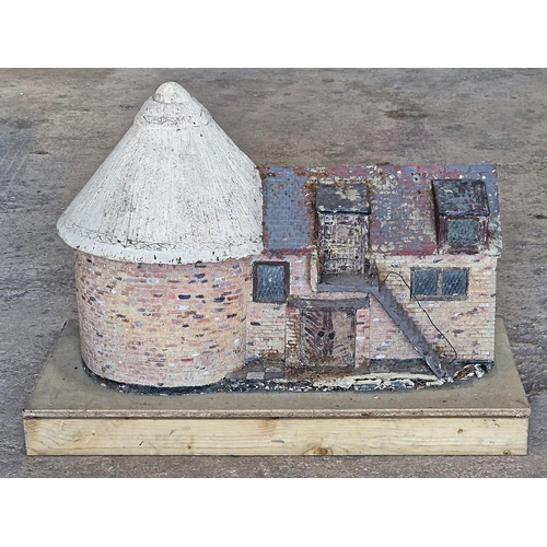 1016 - Large reconstituted stone Kent Oast House model, from a Sussex model village L 104cm x W 48cm x H 74... 