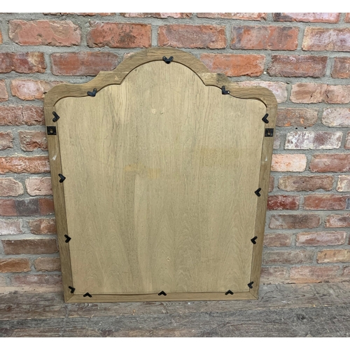 1077 - Oka of London limed oak framed arch panelled mirror, 100 x 80cm