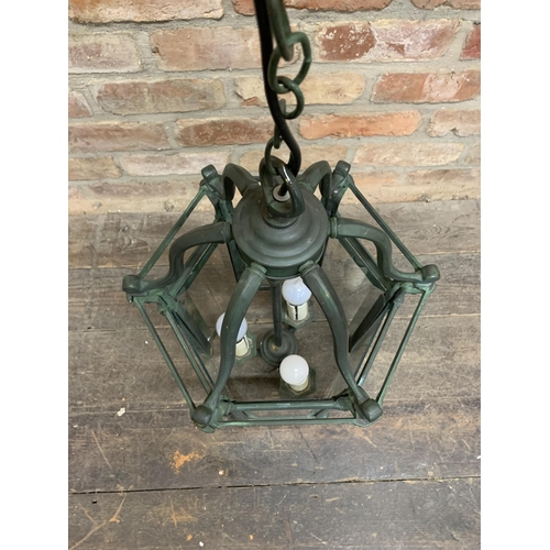 1112 - Good quality patinated bronze and glass hall lantern, hexagonal form, 65cm high