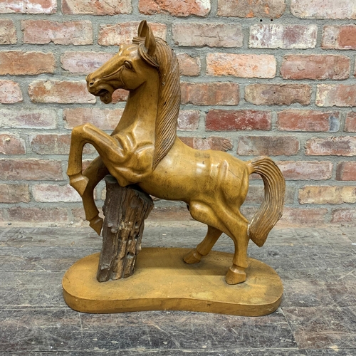 2307 - Good quality carved fruitwood possibly Black Forest study of a rearing horse, 78cm high