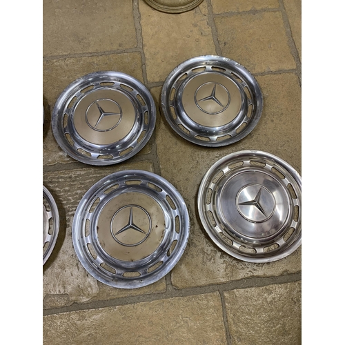 1023 - Two sets of four Mercedes Benz W123 14