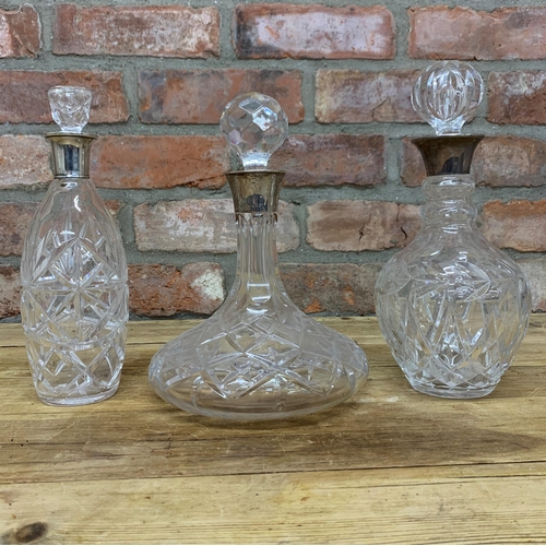 177 - Three silver collared decanters to include flat bottomed ships example (3)