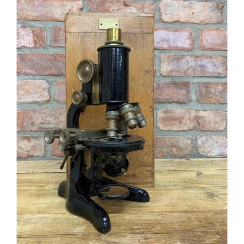 2446 - Antique F.E Becker scientific microscope held in original wooden case, H 31cm