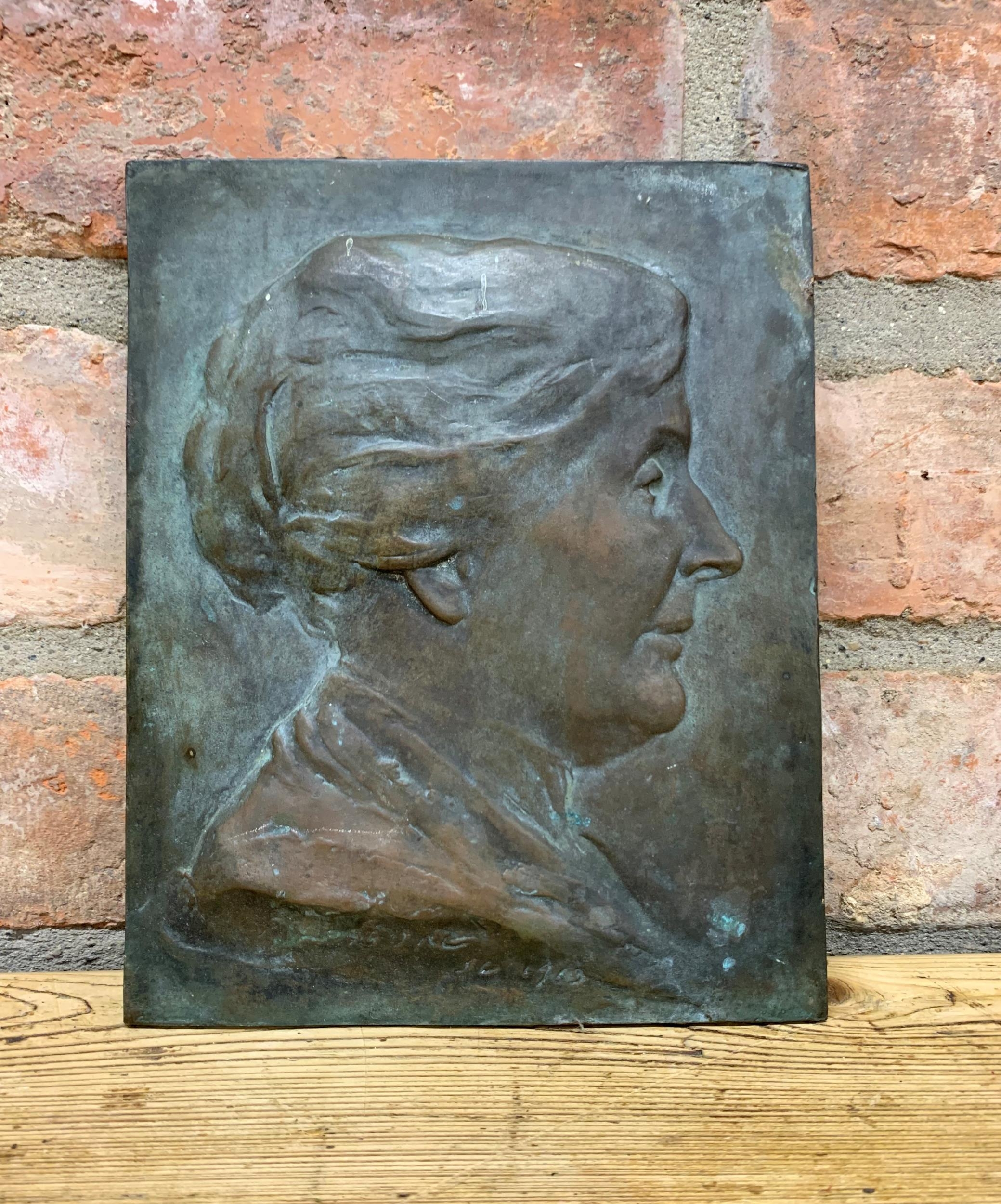 Antique bronze plaque cast with a ladies side head and neck profile ...