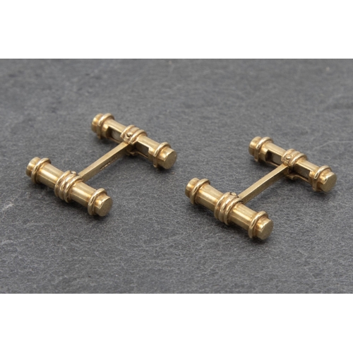 66 - Set of Deakin and Francis 9ct dumbell cufflinks, 2.7cm long, 11.1g