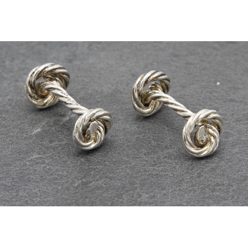 76 - Good quality set of Asprey silver knot cufflinks in original Asprey box, 3cm long, 11.5g