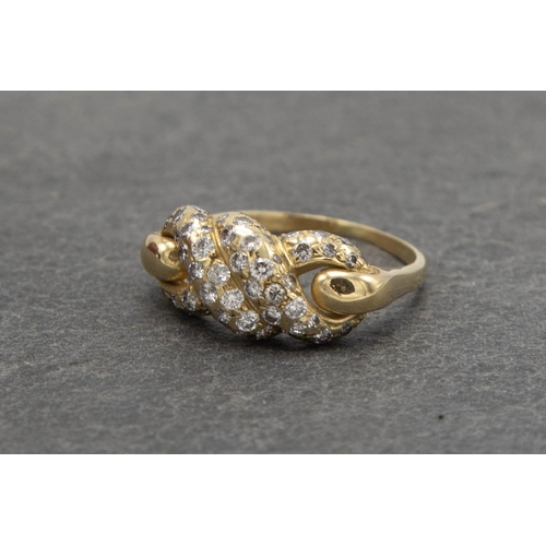 82 - 18ct Cartier diamond knot ring, size N, 4.5g, with Cartier insurance valuation for £2490 dated 1985,... 