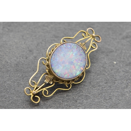 85 - Antique 9ct opal doublet brooch, the stone 15 x 20mm. 4g