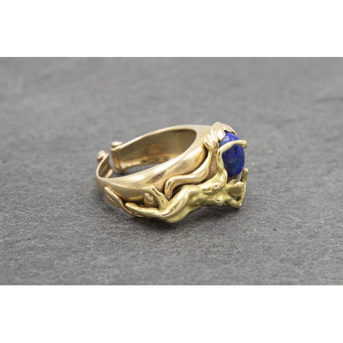 103 - Good quality 18ct Lapis Lazuli figural ring, with reclined nude, size N, 9.7g