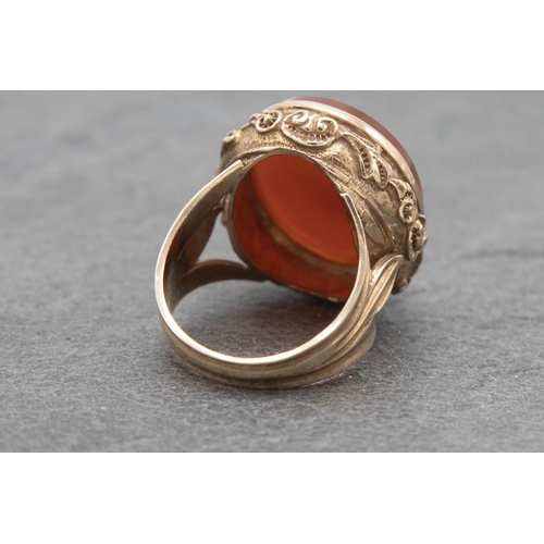 104 - 9ct large carnelian signet ring, size R/S, 12.9g